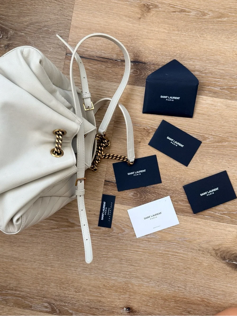 Saint Laurent Off-White Quilted Leather Backpack with Gold YSL Logo